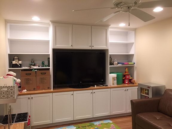 Built-in bookshelves/entertainment shelve in the family room