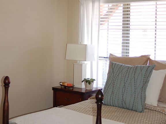 Airy guest bedroom with large closet