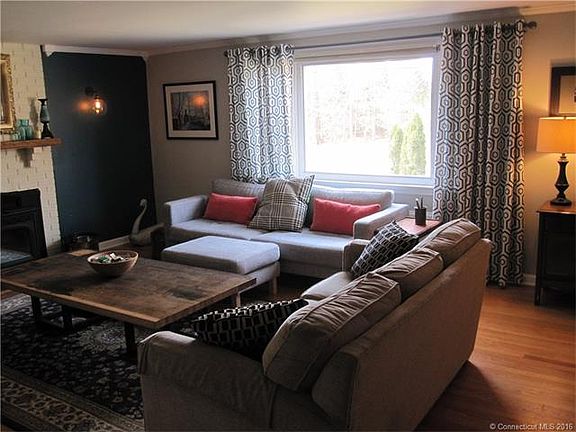 Living room with picture wi...