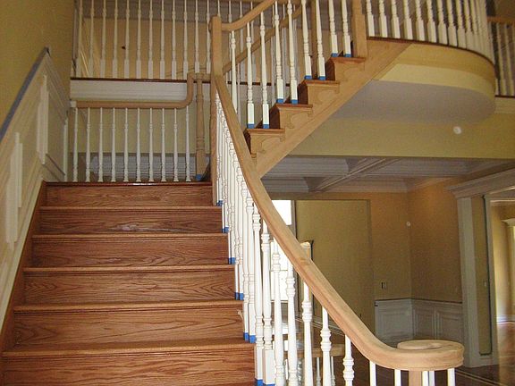 Front staircase (there is also a rear staircase for easy access to 2nd floor)