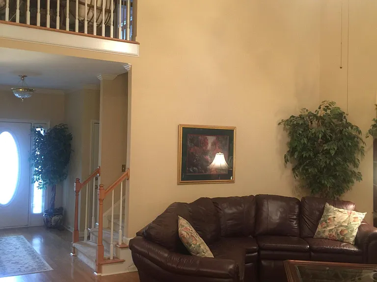 2 Story Great Room - showing upper reading alcove and entry foyer.