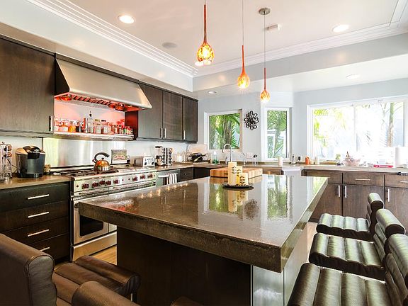 Huge Chefs Kitchen with concrete countertops