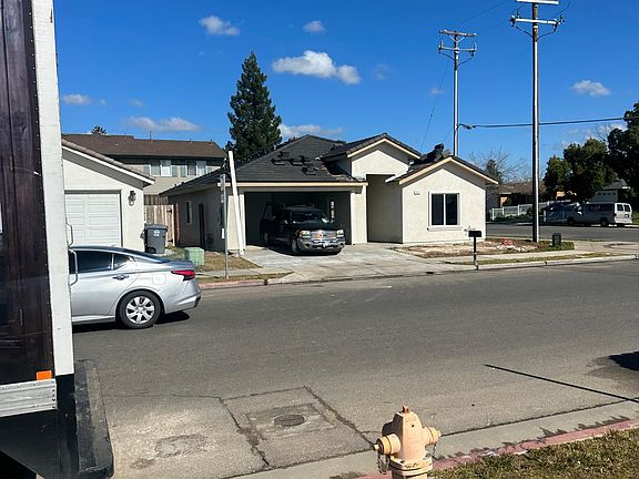 Pic of front of home . Landscaping is now done and home is fully constructed.