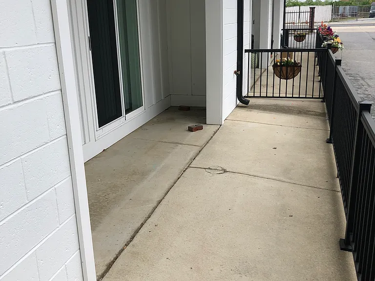 Large front patio with sliding door access