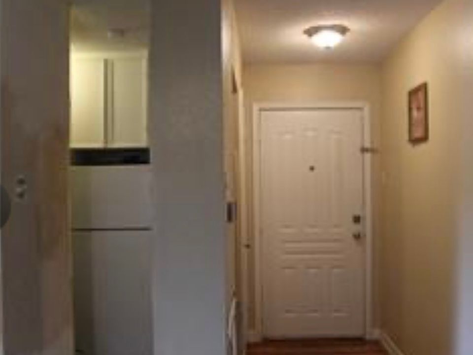 Front drop and kitchen closet on the left