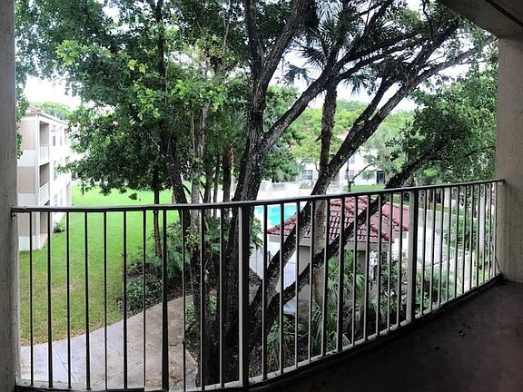balcony overlooks pool