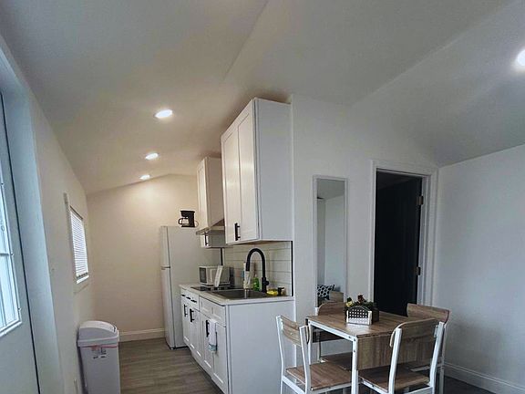 Kitchen and dining area conveniently located together for added comfort.