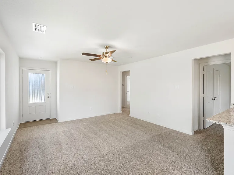 The spacious family room is perfect for family living and hosting.