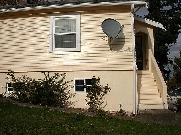 doorway on the right side of the house