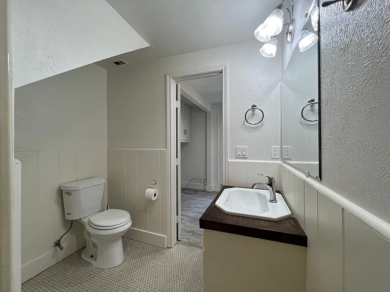 Downstairs full bath, so cute!