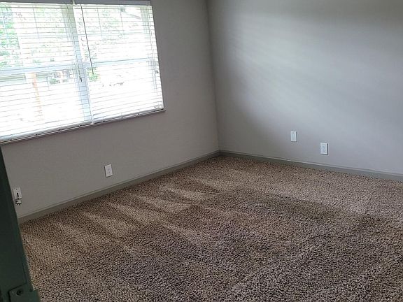 You enter the apartment through the living room.