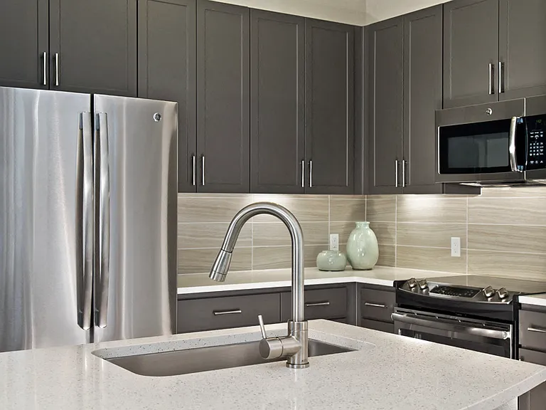 Premium quartz countertops and subway tile backsplash
