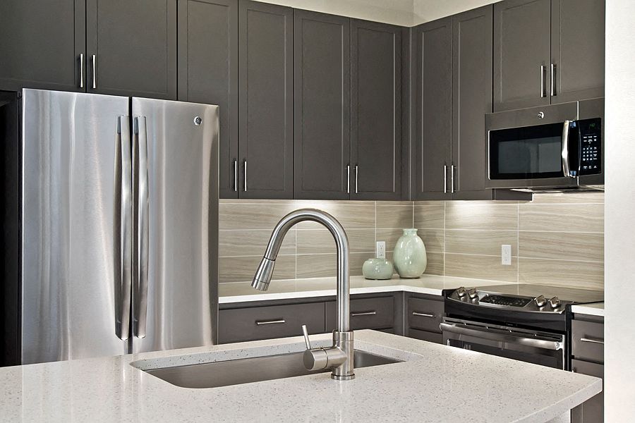 Premium quartz countertops and subway tile backsplash