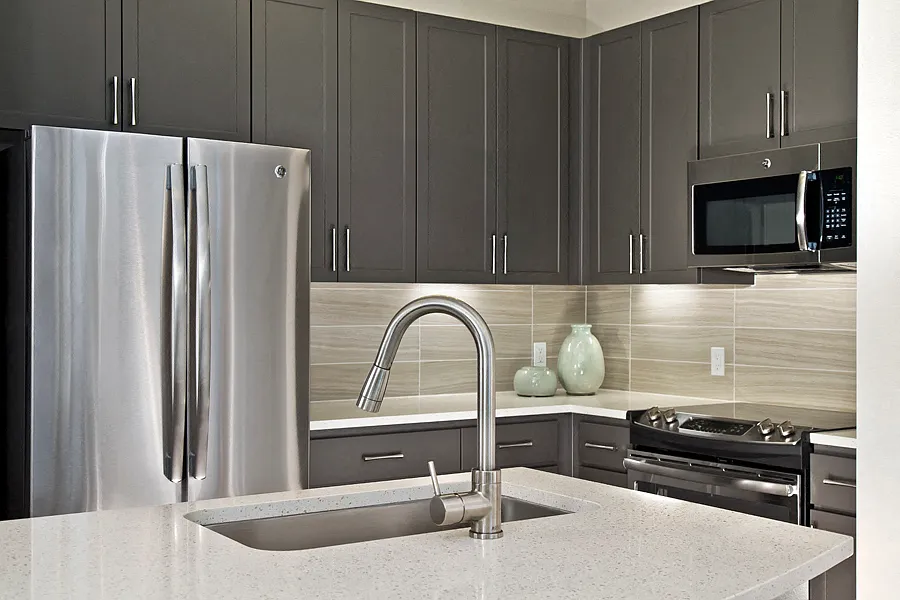 Premium quartz countertops and subway tile backsplash