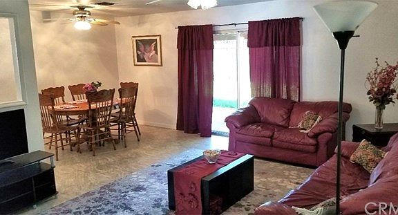 Living room looks into spacious dining area