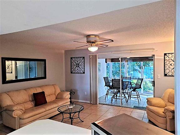 Living Room and large screened patio