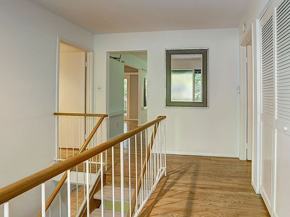 Foyer with Frosted Glass and Floating Stairs
