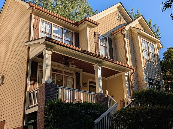 Beautiful approach set up high on the hill from the street. Front greenspace with lots of mature trees and shrubs creating privacy.