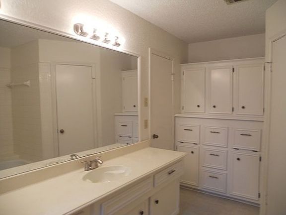 Master bath freshly painted & new tile flooring