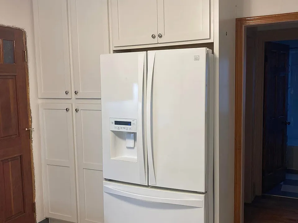 large deluxe fridge, including separate filter in basement for all three kitchen fixtures