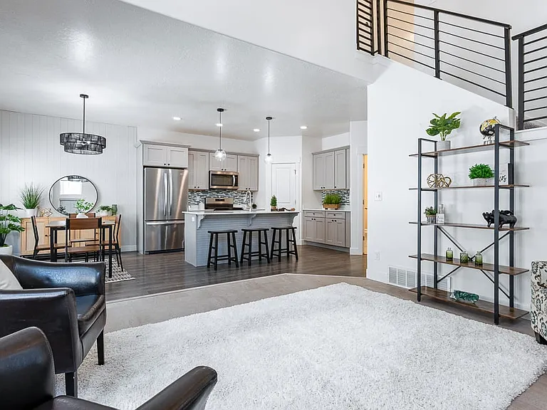 Open floor plan with soaring ceilings