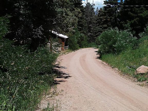 Looking Up Hill Road at Neighbor
