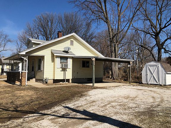 Double Carport and Storage Shed