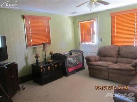 Living room with outside entrance