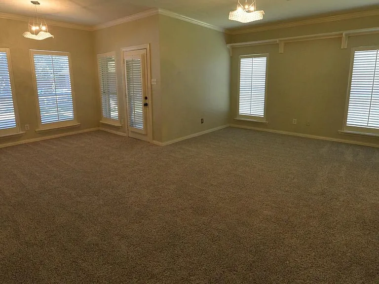 Master bedroom with entry to exercise / garden room / patio