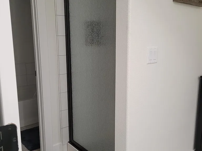 Master shower and tub/toilet (behind door)