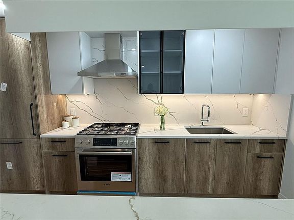 5th image of 1306 83rd St Unit 201