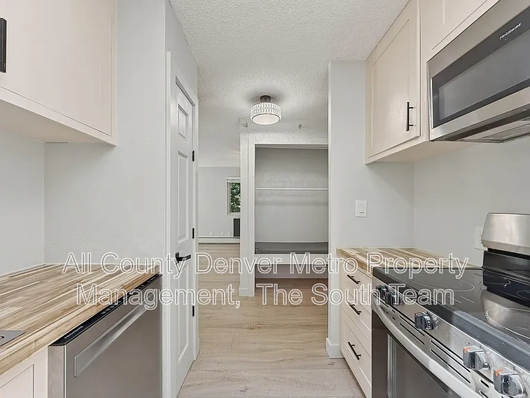 2835 S Monaco Pkwy #1-308 — Photo 7