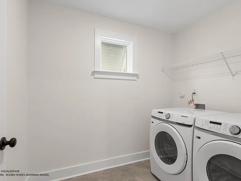 LAUNDRY ROOM (2ND FLOOR) PICTURE FROM A DIFFERENT SAVANNAH MODEL RECENTLY BUILT BY ROLINA HOMES