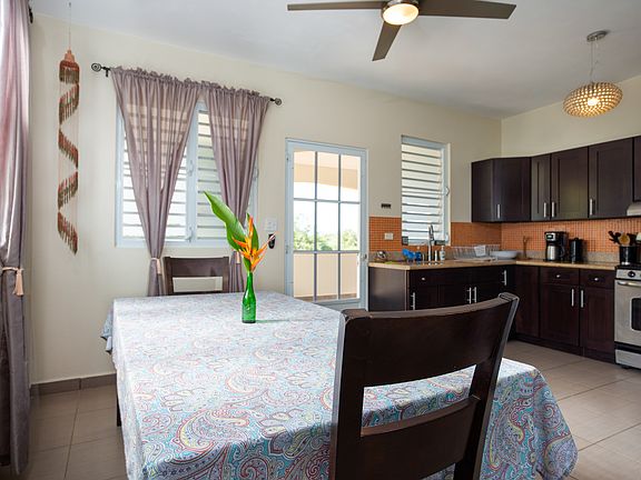 Fully equipped kitchen, with stainless appliances, toaster, microwave, blender, coffee pot, keurig, air fryer, and all the dishes and bakeware you would need.