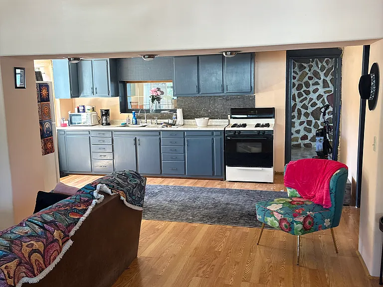 Living room with freshly painted adobe walls