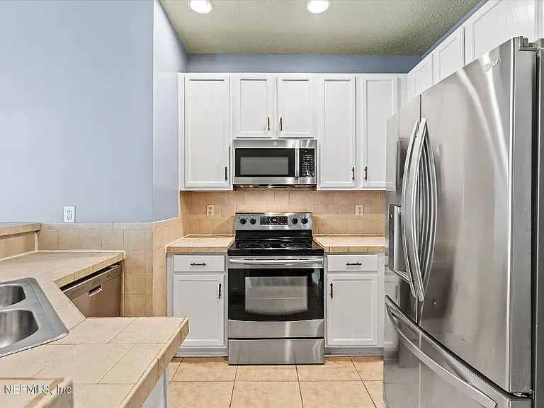 12301 Kernan Forest Blvd — Photo 5