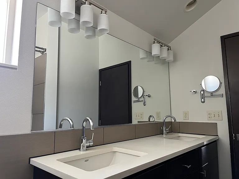 Primary bath with two sinks.