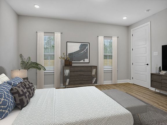 Primary bedroom in the Taylor floorplan at a Meritage Homes community in Gulfport, MS.