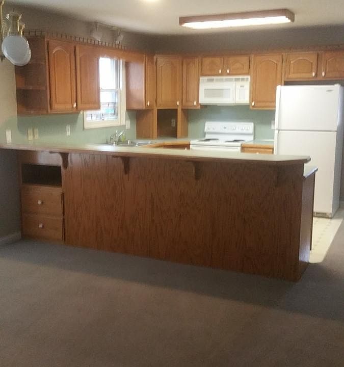 Kitchen next to dining room open