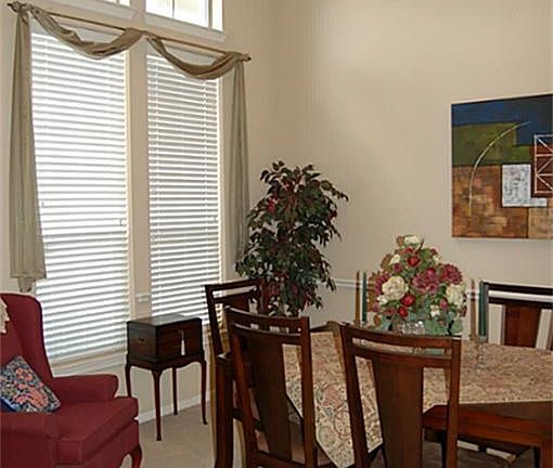 Tall windows flood the room with light