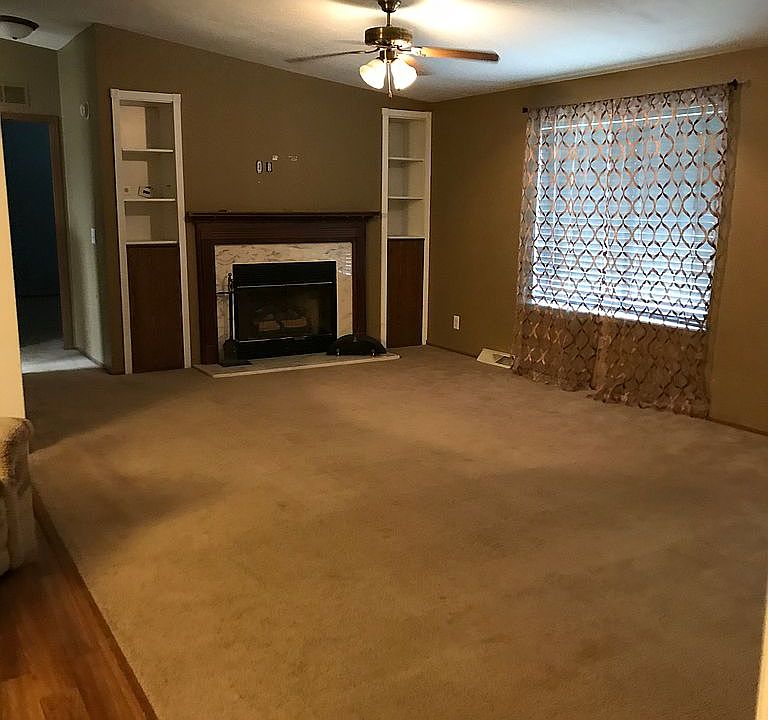 Living room with fireplace.