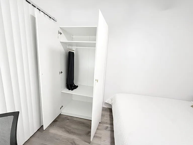 Large closet with lots of storage. There is additional storage in the under the bed drawers.