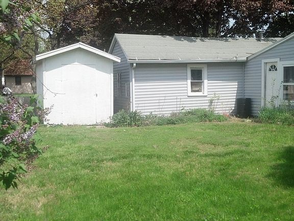 Large garage and shed make for great storage