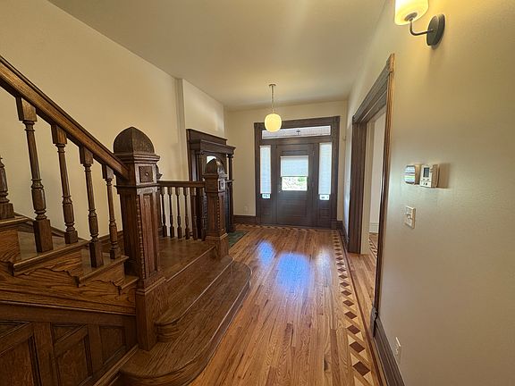 View from foyer looking toward new sapele front door with side lites