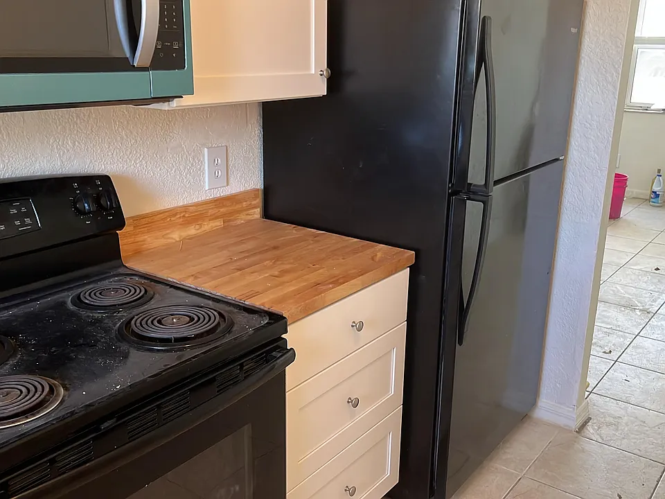 New kitchen cabinets with new Butcher Block countertops!