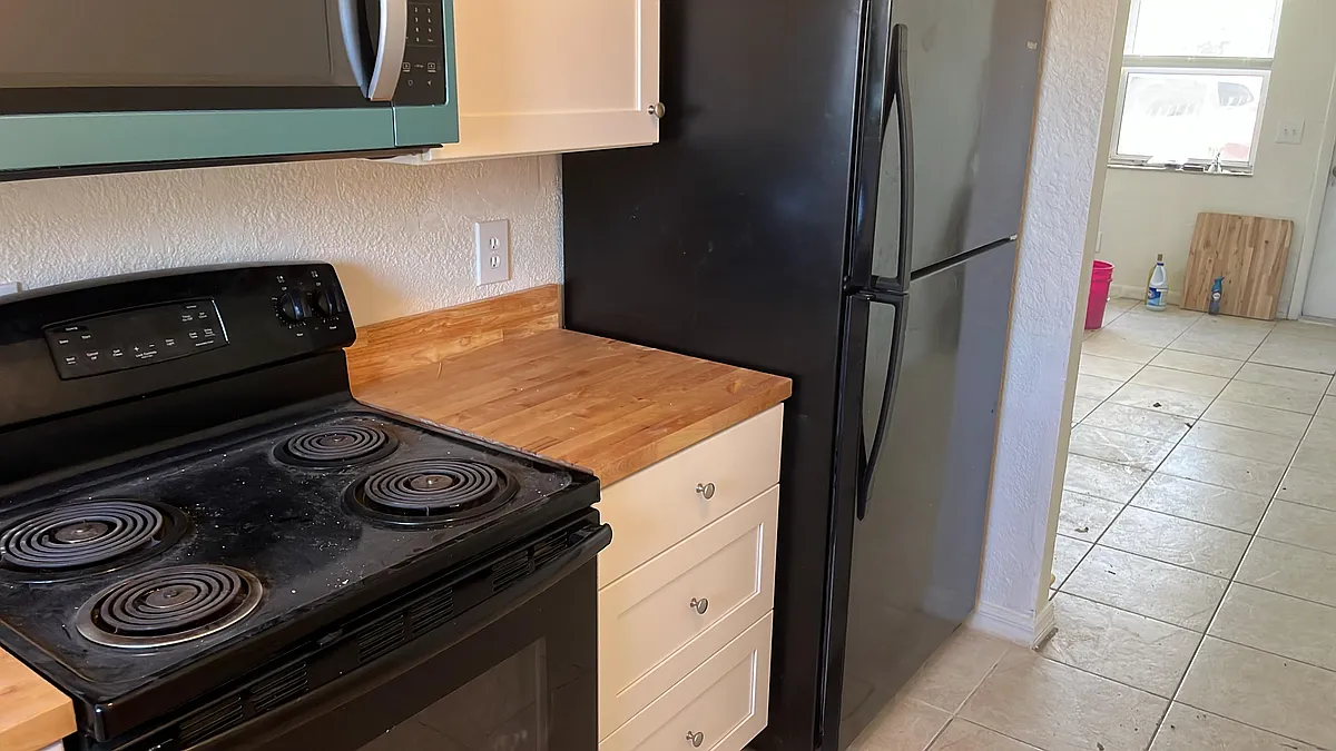 New kitchen cabinets with new Butcher Block countertops! - 1634 W 26th Ct #A