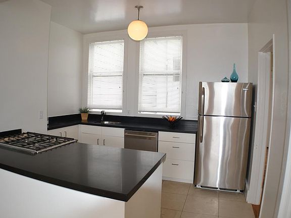 Updated kitchen with stainless steel appliances.