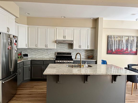 Remodeled kitchen with stainless steel appliances and Granite countertop