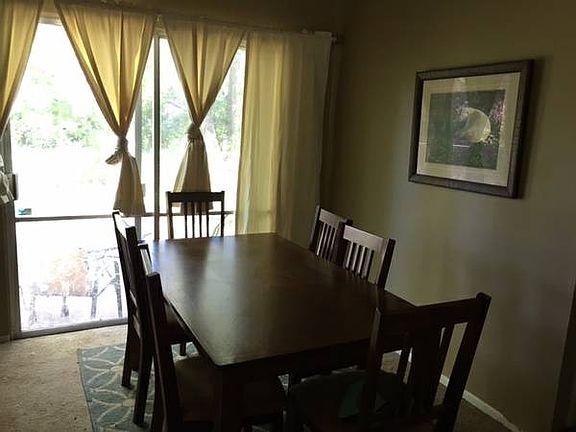 Good size dining room between kitchen and bedrooms.