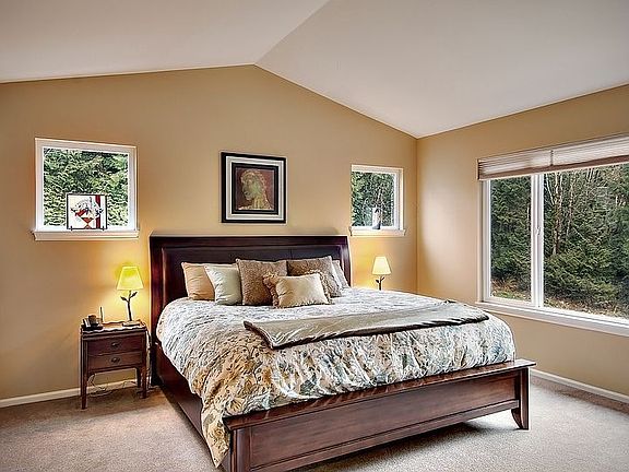 Master bedroom with vaulted ceilings